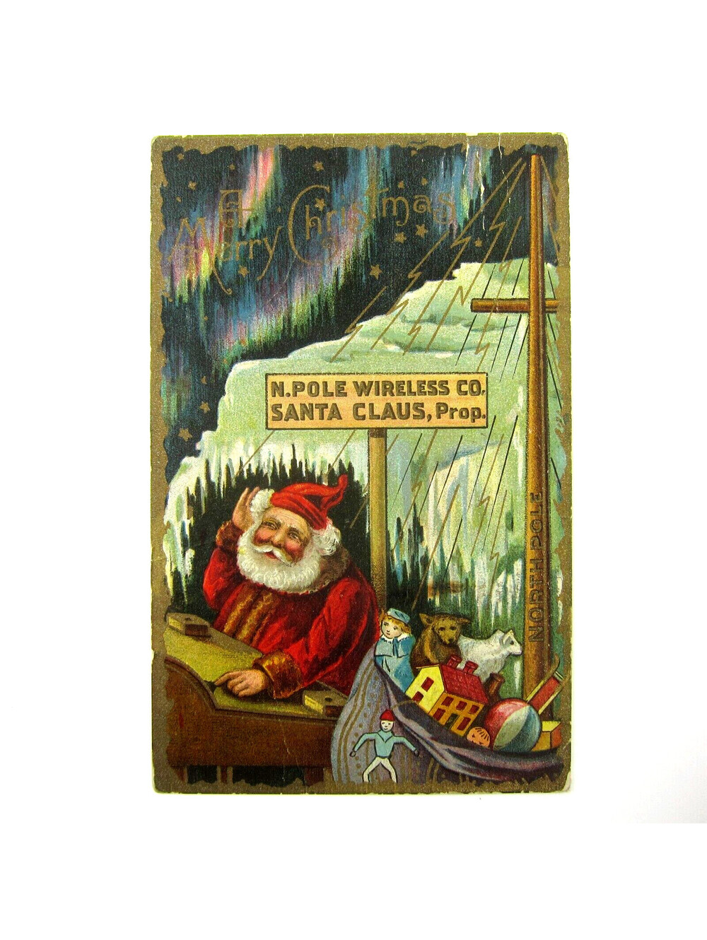 Christmas Postcard Santa North Pole Bag Toys Northern Lights Sky Antique 1912